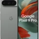 Front and back views of a Google Pixel 9 Pro smartphone in a gray finish, showing a punch-hole front camera and a triple-lens rear camera array with a Google 'G' on the back panel.