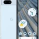 Front and back view of a light blue Google Pixel smartphone, showing the home screen with weather widget and app icons.