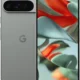 Front and back view of a gray Google Pixel smartphone with a horizontal triple-camera bar on the back, displaying a colorful abstract wallpaper on its screen