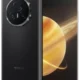 Foldable smartphone opened, showing a circular camera module on the back and a planet wallpaper on the front screen; 'HONOR' logo visible on the back.
