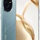 Honor smartphone with teal back featuring a rounded quad-camera module and vertical branding; front shows a nearly edge-to-edge screen with a centered punch-hole camera and gold abstract wallpaper.