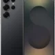 Samsung Galaxy smartphone shown from back with quad-camera array and flash, next to its front display with abstract wallpaper.