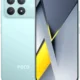 Mint green Poco smartphone showing back quad-camera module and brand logo visible, with front display turned on